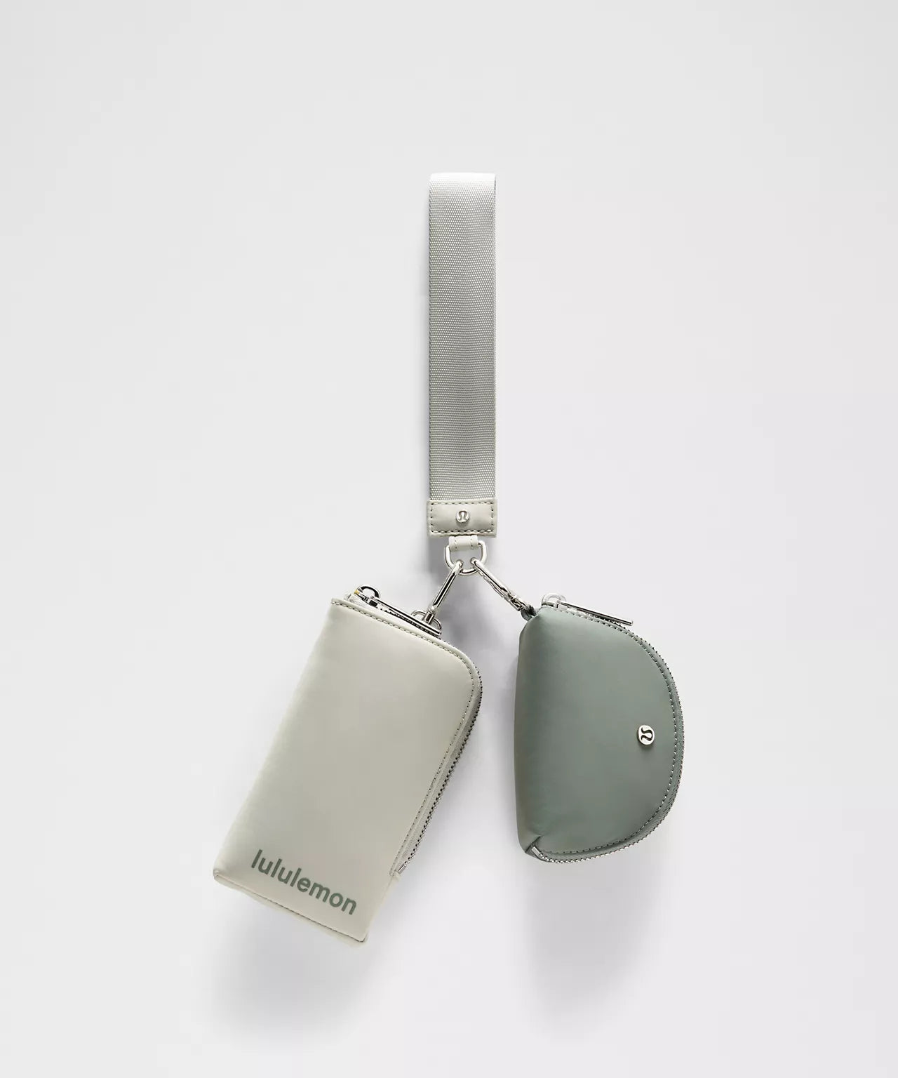 LULULEMON MUÑEQUERA CON DOBLE BOLSO